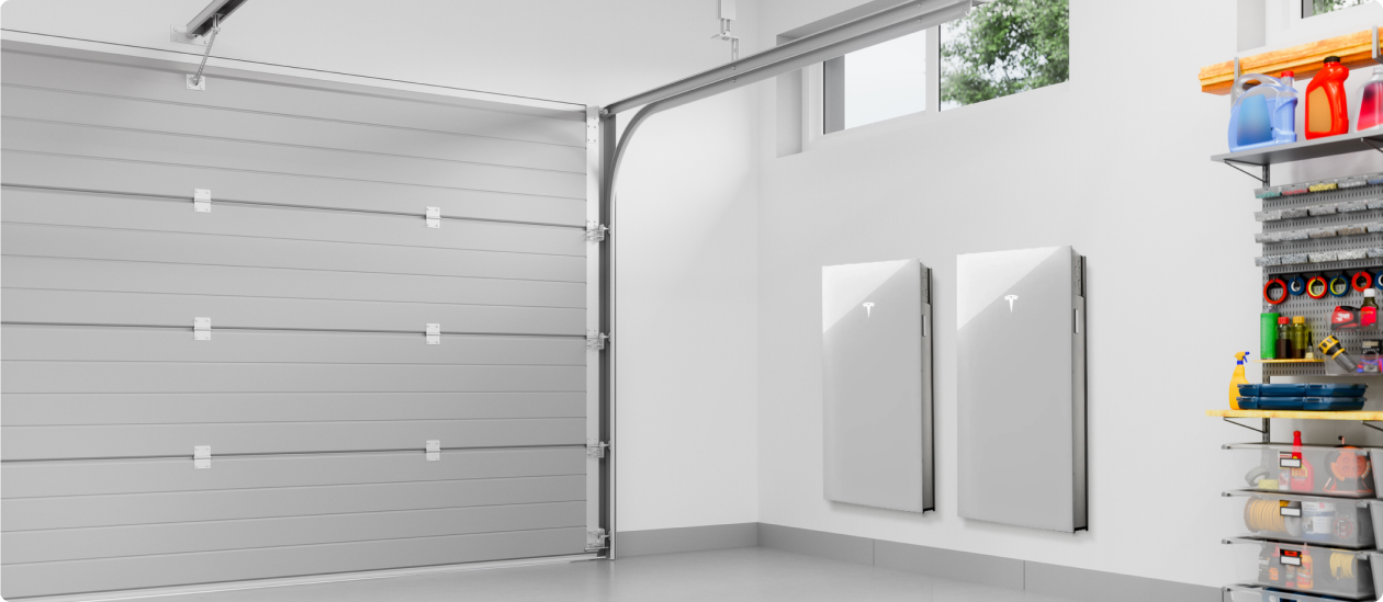 Two Tesla batteries in a garage provide home battery backup without solar