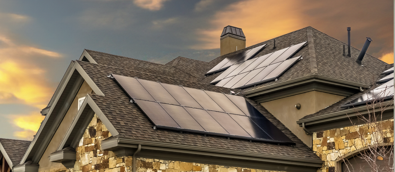 Home  at Dusk with solar panels installed  on roof