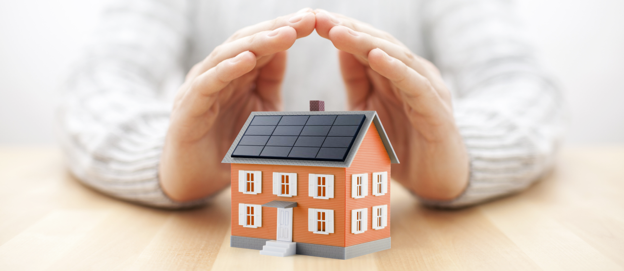 A conceptual view of a home with rooftop solar being covered