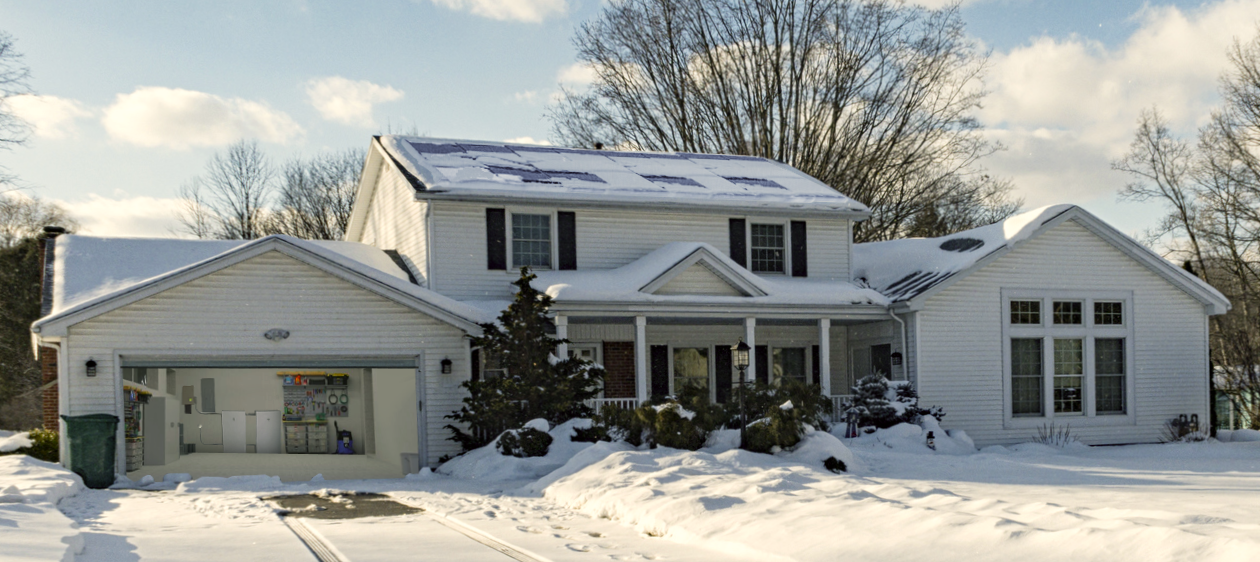 White house with black shutters keeps the lights on during a winter storm with solar and home backup